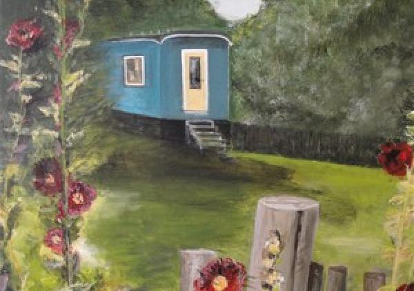 Open veldje met een wagen