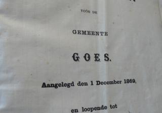 Voorblad van een bevolkingsregister met tekst "Register van Bevolking voor de Gemeente Goes. Aangelegd den 1 december 1869 en loopende tot 18"